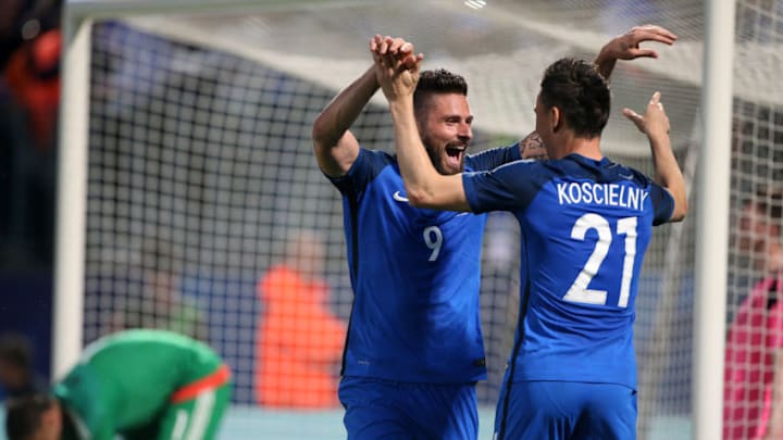 METZ, FRANCE - JUNE 4: Olivier Giroud of France congratulates teammate Laurent Koscielny as he scores the 3rd goal for France during the international friendly match between France and Scotland at Stade Saint Symphorien on June 4, 2016 in Metz, France. (Photo by Jean Catuffe/Getty Images)