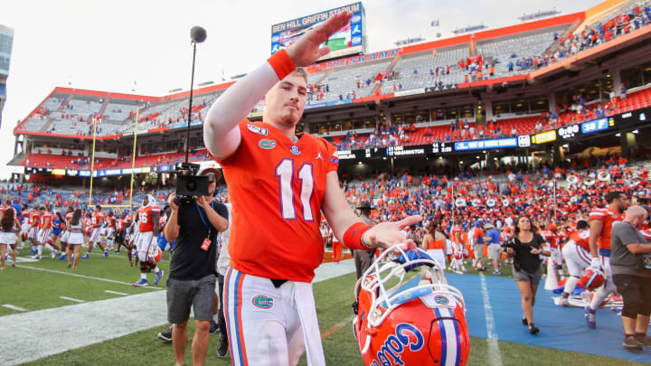 GAINESVILLE, FLORIDA – SEPTEMBER 28: Kyle Trask #11 of the Florida Gators celebrates after a game against the Towson Tigers. (Photo by James Gilbert/Getty Images)
