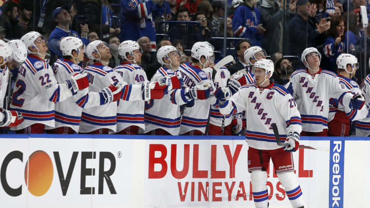 Feb 2, 2017; Buffalo, NY, USA; New York Rangers defenseman Ryan McDonagh (27) celebrates a goal during the second period against the Buffalo Sabres at KeyBank Center. Mandatory Credit: Timothy T. Ludwig-USA TODAY Sports