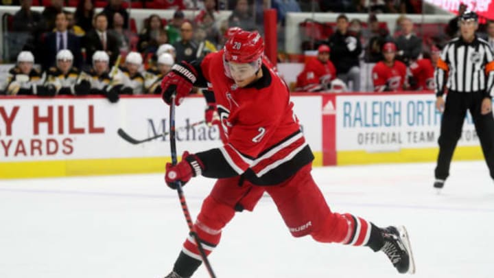 RALEIGH, NC – OCTOBER 30: Sebastian Aho #20 of the Carolina Hurricanes fires a slapshot during an NHL game against the Boston Bruins on October 30, 2018 at PNC Arena in Raleigh, North Carolina. (Photo by Gregg Forwerck/NHLI via Getty Images)