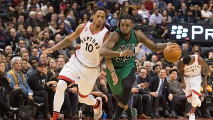 Jan 20, 2016; Toronto, Ontario, CAN; Boston Celtics forward Jae Crowder (99) takes the ball up court as Toronto Raptors guard DeMar DeRozan (10) tries to defend during the fourth quarter in a game at Air Canada Centre. The Toronto Raptors won 115-109. Mandatory Credit: Nick Turchiaro-USA TODAY Sports