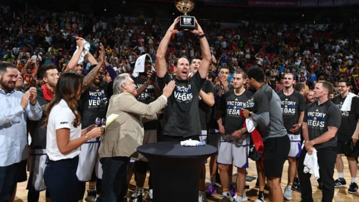LAS VEGAS, NV - JULY 17: Head Coach Jud Buechler of the Los Angeles Lakers hoists the NBA Summer League Championship trophy after the game against the Portland Trail Blazers during the 2017 Summer League Finals on July 17, 2017 at the Thomas & Mack Center in Las Vegas, Nevada. NOTE TO USER: User expressly acknowledges and agrees that, by downloading and/or using this Photograph, user is consenting to the terms and conditions of the Getty Images License Agreement. Mandatory Copyright Notice: Copyright 2017 NBAE (Photo by Garrett Ellwood/NBAE via Getty Images)