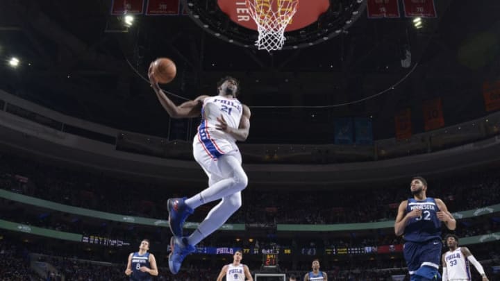 PHILADELPHIA,PA - MARCH 24 : Joel Embiid #21 of the Philadelphia 76ers dunks the ball against the Minnesota Timberwolves at Wells Fargo Center on March 24, 2018 in Philadelphia, Pennsylvania NOTE TO USER: User expressly acknowledges and agrees that, by downloading and/or using this Photograph, user is consenting to the terms and conditions of the Getty Images License Agreement. Mandatory Copyright Notice: Copyright 2018 NBAE (Photo by Jesse D. Garrabrant/NBAE via Getty Images)