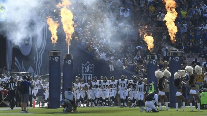 Aug 13, 2016; Los Angeles, CA, USA; The Los Angeles Rams enter the field before the game against the Dallas Cowboys at Los Angeles Memorial Coliseum. Mandatory Credit: Richard Mackson-USA TODAY Sports