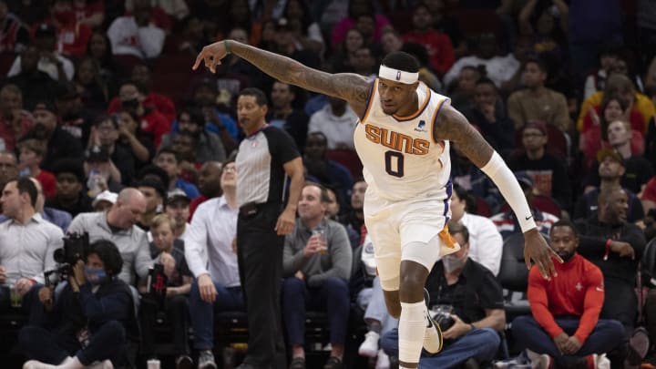 Who to root for now that the Denver Nuggets are eliminated? Mar. 16, 2022; Houston, Texas, USA; Phoenix Suns forward Torrey Craig (0) reacts to his three point basket against the Houston Rockets in the second half at Toyota Center. (Thomas B. Shea-USA TODAY Sports)