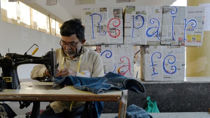 A tailor at a Repair Cafe in Bangalore, India in 2015