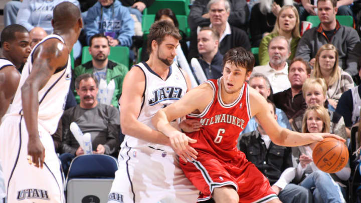 SALT LAKE CITY, UT - JANUARY 16: Andrew Bogut #6 of the Milwaukee Bucks posts up Mehmet Okur #13 of the Utah Jazz at EnergySolutions Arena on January 16, 2010 in Salt Lake City, Utah. NOTE TO USER: User expressly acknowledges and agrees that, by downloading and or using this Photograph, User is consenting to the terms and conditions of the Getty Images License Agreement. Mandatory Copyright Notice: Copyright 2010 NBAE (Photo by Melissa Majchrzak/NBAE/Getty Images)