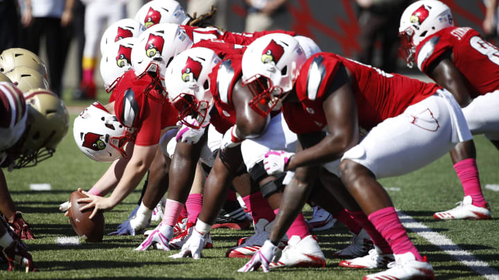 LOUISVILLE, KY – OCTOBER 14: Louisville Cardinals players face off at the line of scrimmage during a game against the Boston College Eagles at Papa John’s Cardinal Stadium on October 14, 2017 in Louisville, Kentucky. Boston College won 45-42. (Photo by Joe Robbins/Getty Images) *** Local Caption ***