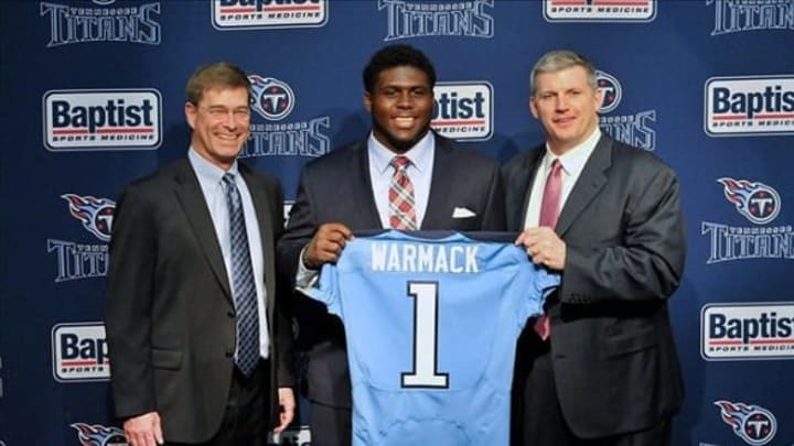 Apr 26, 2013; Nashville, TN, USA; Tennessee Titans first round draft choice Chance Warmack (center) poses for a photo with general manager Ruston Webster (left) and head coach Mike Munchak (right) during a press conference at Baptist Sports Park. Mandatory Credit: Jim Brown-USA TODAY Sports