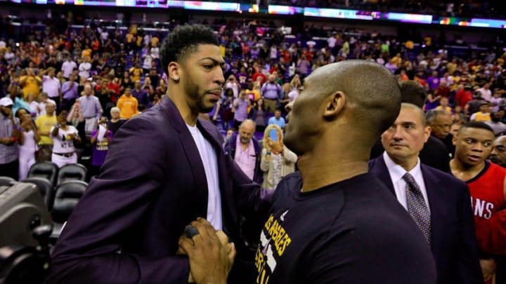Apr 8, 2016; New Orleans, LA, USA; New Orleans Pelicans forward Anthony Davis talks with Los Angeles Lakers forward Kobe Bryant following his final appearance in New Orleans at the Smoothie King Center. The Pelicans defeated the Lakers 110-102. Mandatory Credit: Derick E. Hingle-USA TODAY Sports