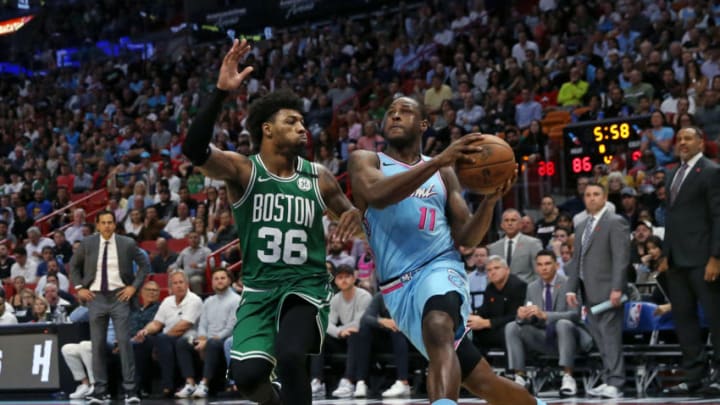 Miami Heat guard Dion Waiters (11) drives against Boston Celtics guard Marcus Smart (36)David Santiago/Miami Herald/Tribune News Service via Getty Images)