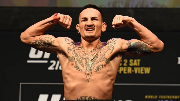 DETROIT, MI - DECEMBER 01: Max Holloway poses on the scale during the UFC 218 weigh-in inside Little Caesars Arena on December 1, 2017 in Detroit, Michigan. (Photo by Josh Hedges/Zuffa LLC/Zuffa LLC via Getty Images)