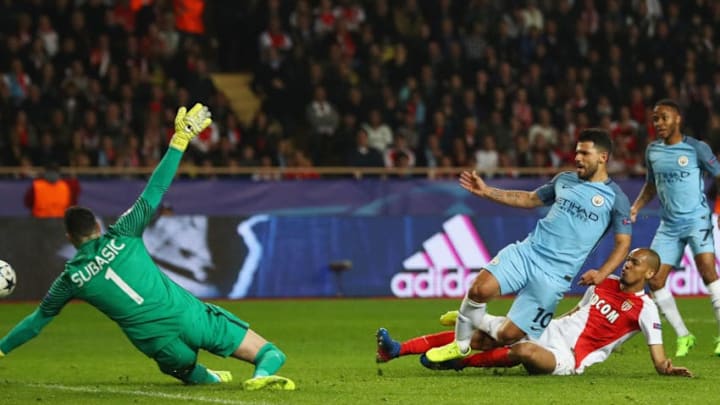MONACO - MARCH 15: Danijel Subasic of AS Monaco (1) makes a save from Sergio Aguero of Manchester City as Fabinho of AS Monaco challenges during the UEFA Champions League Round of 16 second leg match between AS Monaco and Manchester City FC at Stade Louis II on March 15, 2017 in Monaco, Monaco. (Photo by Michael Steele/Getty Images)