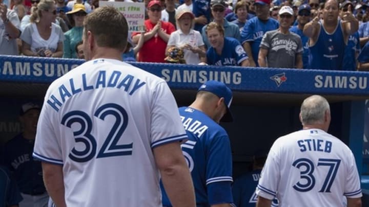 Aug 14, 2016; Toronto, Ontario, CAN; Former Toronto Blue Jays pitchers Roy Halladay and Dave Stieb walk towards the dugout after the 40th Season Ceremonies prior to a game against the Houston Astros at Rogers Centre. The Toronto Blue Jays won 9-2. Mandatory Credit: Nick Turchiaro-USA TODAY Sports