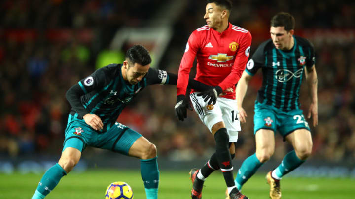 MANCHESTER, ENGLAND – DECEMBER 30: Jesse Lingard of Manchester United battles with Maya Yoshida and Pierre-Emile Hojbjerg of Southampton during the Premier League match between Manchester United and Southampton at Old Trafford on December 30, 2017 in Manchester, England. (Photo by Clive Mason/Getty Images)