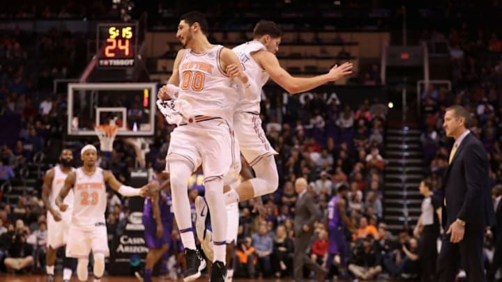 PHOENIX, AZ - JANUARY 26: Enes Kanter #00 and Doug McDermott #20 of the New York Knicks celebrate after scoring against the Phoenix Suns during the second half of the NBA game at Talking Stick Resort Arena on January 26, 2018 in Phoenix, Arizona. (Photo by Christian Petersen/Getty Images)