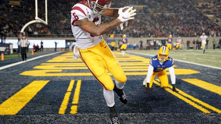 BERKELEY, CALIFORNIA - NOVEMBER 16: Michael Pittman Jr. #6 of the USC Trojans catches a touchdown pass over Elijah Hicks #3 of the California Golden Bears during the second quarter of an NCAA football game at California Memorial Stadium on November 16, 2019 in Berkeley, California. (Photo by Thearon W. Henderson/Getty Images)