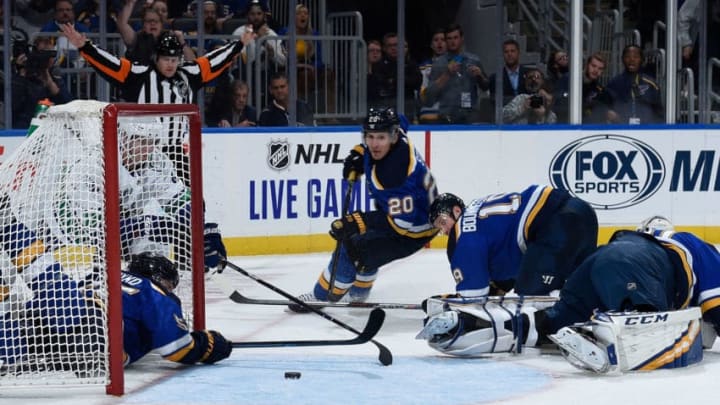 ST. LOUIS, MO - OCTOBER 17: Colton Parayko #55 Alexander Steen #20 and Jay Bouwmeester #19 of the St. Louis Blues defend the net against the Vancouver Canucks at Enterprise Center on October 17, 2019 in St. Louis, Missouri. (Photo by Joe Puetz/NHLI via Getty Images)