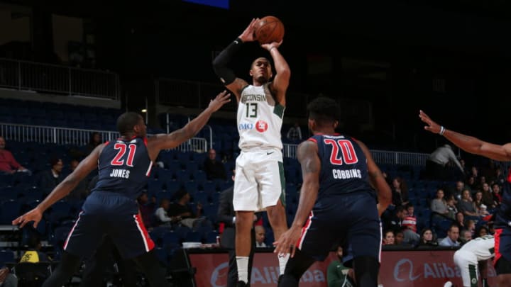 WASHINGTON, DC - NOVEMBER 17: Cam Reynolds #13 of the Wisconsin Herd shoots against Jalen Jones #21 of the Capital City Go-Go during a NBA G-League game at the Entertainment and Sports Arena on November 17, 2019 in Washington, DC. NOTE TO USER: User expressly acknowledges and agrees that, by downloading and or using this photograph, User is consenting to the terms and conditions of the Getty Images License Agreement. (Photo by Ned Dishman/NBAE via Getty Images)