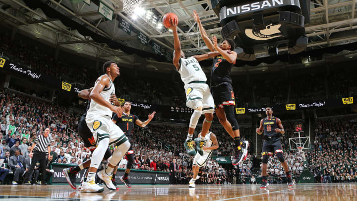 EAST LANSING, MI – JANUARY 21: Cassius Winston #5 of the Michigan State Spartans drives to the basket while defended by Aaron Wiggins #2 of the Maryland Terrapins at Breslin Center on January 21, 2019 in East Lansing, Michigan. (Photo by Rey Del Rio/Getty Images)