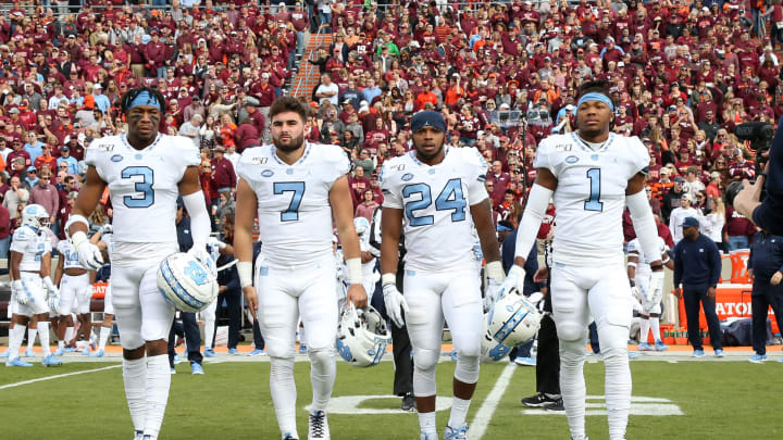 BLACKSBURG, VA – OCTOBER 19: Team captains Dominique Ross #3, Sam Howell #7, Antonio Williams #24, and Myles Dorn #1 of the University of North Carolina walk out for the coin flip during a game between North Carolina and Virginia Tech at Lane Stadium on October 19, 2019 in Blacksburg, Virginia. (Photo by Andy Mead/ISI Photos/Getty Images)
