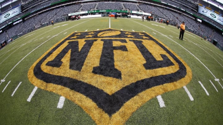 EAST RUTHERFORD, NJ - SEPTEMBER 13: The NFL shield is painted in gold and black after a game between the Cleveland Browns and the New York Jets at MetLife Stadium on September 13, 2015 in East Rutherford, New Jersey. The new color scheme is to commemorate this years' Super Bowl witch will be the 50th edition. (Photo by Rich Schultz /Getty Images)