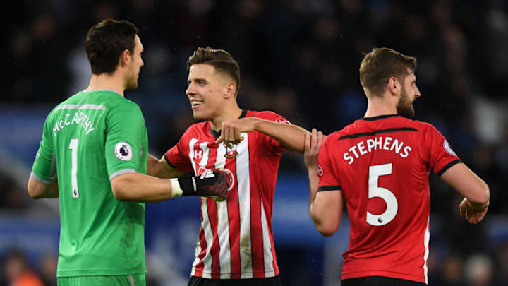 LEICESTER, ENGLAND - JANUARY 12: Jan Bednarek celebrates with teammates Alex McCarthy and Jack Stephens of Southampton following the Premier League match between Leicester City and Southampton FC at The King Power Stadium on January 12, 2019 in Leicester, United Kingdom. (Photo by Michael Regan/Getty Images)
