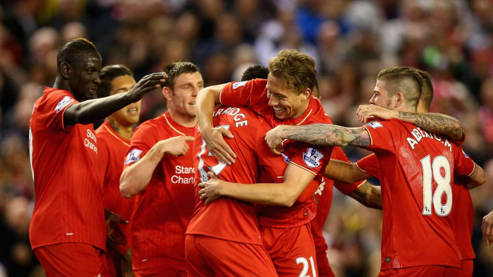 LIVERPOOL, ENGLAND – APRIL 20: Daniel Sturridge of Liverpool celebrates with Lucas Leiva of Liverpool after scoring his sides third goal during the Barclays Premier League match between Liverpool and Everton at Anfield, April 20, 2016, Liverpool, England (Photo by Clive Brunskill/Getty Images)