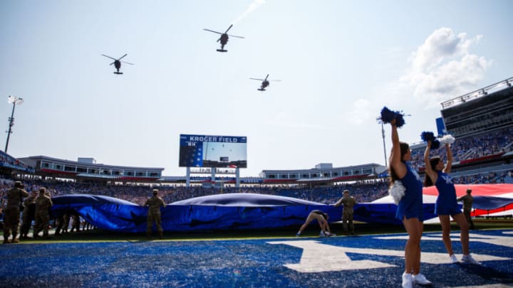 Sep 17, 2022; Lexington, Kentucky, USA; Air Force ROTC members hold a large American Flag across the field before the game between the Kentucky Wildcats and the Youngstown State Penguins at Kroger Field. Mandatory Credit: Jordan Prather-USA TODAY Sports