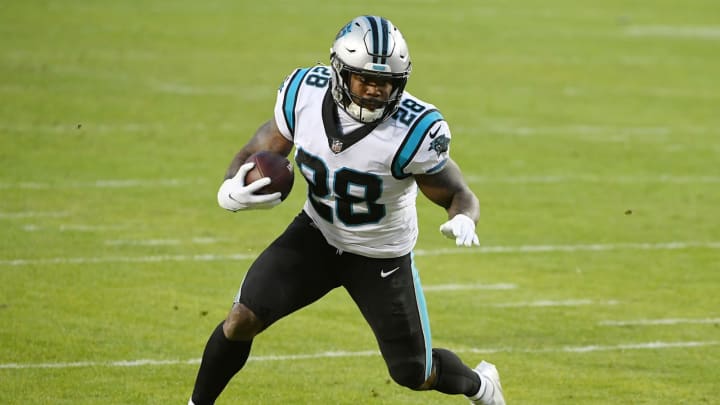 LANDOVER, MARYLAND – DECEMBER 27: Mike Davis #28 of the Carolina Panthers runs with the ball against the Washington Football Team during the second quarter at FedExField on December 27, 2020 in Landover, Maryland. (Photo by Will Newton/Getty Images)
