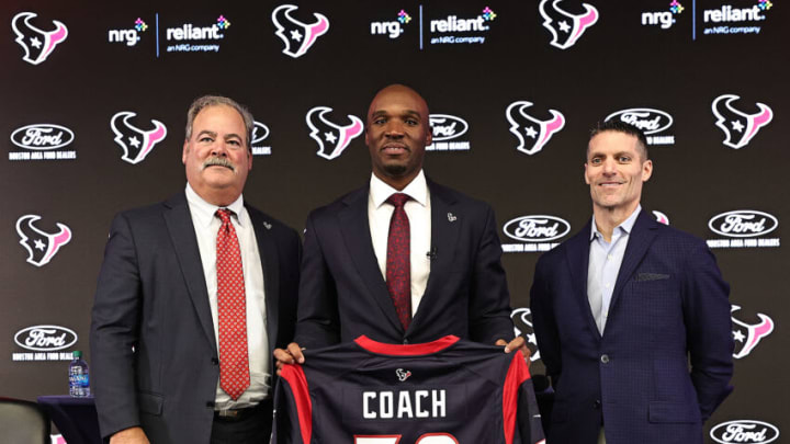 HOUSTON, TEXAS - FEBRUARY 02: DeMeco Ryans (C) is introduced as the Houston Texans head coach by Chairman and CEO Cal McNair (L) and general manager Nick Caserio at NRG Stadium on February 02, 2023 in Houston, Texas. (Photo by Bob Levey/Getty Images)