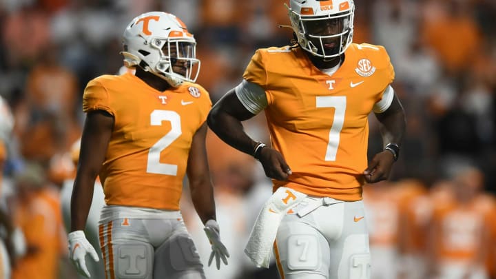 Tennessee quarterback Joe Milton III (7) walks onto the field with running back Jabari Small (2) for Tennessee’s first play in the NCAA college football game between the Tennessee Volunteers and Bowling Green Falcons in Knoxville, Tenn. on Thursday, September 2, 2021.Ut Bowling Green