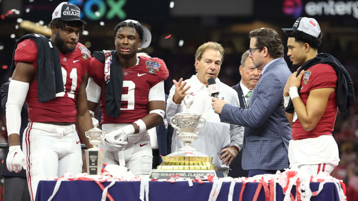 Dec 31, 2022; New Orleans, LA, USA; Alabama Crimson Tide linebacker Will Anderson Jr. (31) defensive back Jordan Battle (9) head coach Nick Saban and quarterback Bryce Young (9) celebrate the victory against the Kansas State Wildcats in the 2022 Sugar Bowl at Caesars Superdome. Mandatory Credit: Stephen Lew-USA TODAY Sports