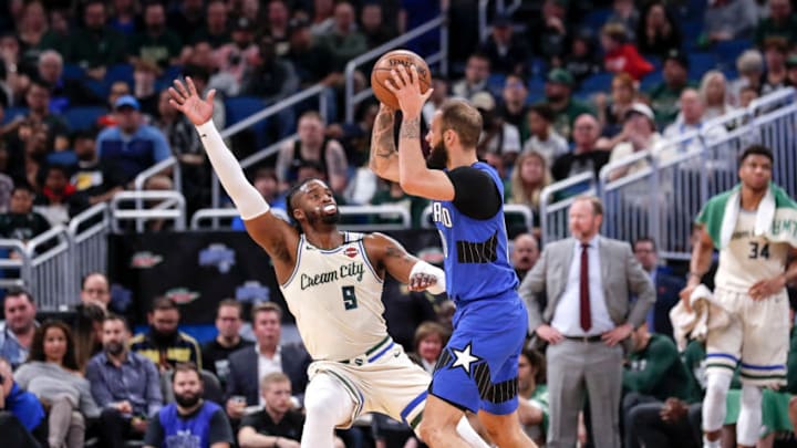 ORLANDO, FL - FEBRUARY 8: Wesley Matthews#9 of the Milwaukee Bucks defends Evan Fournier #10 of the Orlando Magic during the game at the Amway Center on February 8, 2020 in Orlando, Florida. The Bucks defeated the Magic 111 to 95. NOTE TO USER: User expressly acknowledges and agrees that, by downloading and or using this photograph, User is consenting to the terms and conditions of the Getty Images License Agreement. (Photo by Don Juan Moore/Getty Images)