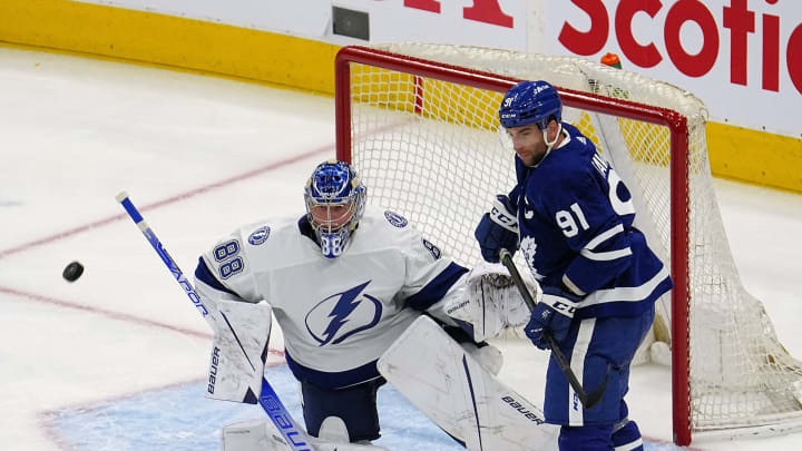May 2, 2022; Toronto, Ontario, CAN; Tampa Bay Lightning goaltender Andrei Vasilevskiy (88) defends the goal against Toronto Maple Leafs forward John Tavares (91) during the second period of game one of the first round of the 2022 Stanley Cup Playoffs at Scotiabank Arena. Mandatory Credit: John E. Sokolowski-USA TODAY Sports