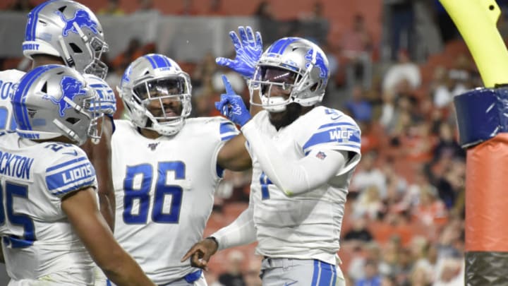 CLEVELAND, OHIO - AUGUST 29: Tight end Jerome Cunningham #86 celebrates with quarterback Josh Johnson #4 of the Detroit Lions after Johnson ran in a touchdown during the second half of a preseason game against the Cleveland Browns at FirstEnergy Stadium on August 29, 2019 in Cleveland, Ohio. The Browns defeated the Lions 20-16. (Photo by Jason Miller/Getty Images)