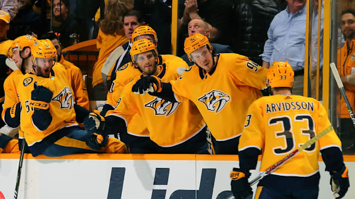 FanDuel NHL: NASHVILLE, TN - MARCH 13: Austin Watson #51, Ryan Hartman #38, and Ryan Johansen #92 of the Nashville Predators congratulate teammate Viktor Arvidsson #33 on scoring a short handed goal against the Winnipeg Jets during the first period at Bridgestone Arena on March 13, 2018 in Nashville, Tennessee. (Photo by Frederick Breedon/Getty Images)