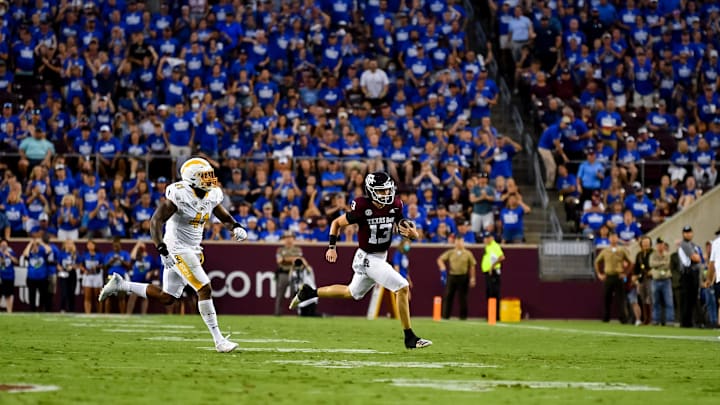 Sep 4, 2021; College Station, Texas, USA; Texas A&M Aggies quarterback Haynes King (13) runs the ball in the second quarter against the Kent State Golden Flashes at Kyle Field. Mandatory Credit: Maria Lysaker-USA TODAY Sports