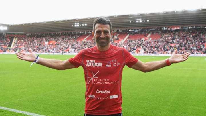 SOUTHAMPTON, ENGLAND - OCTOBER 16: Former Southampton player and charity fundraiser Francis Benali salutes the crowd as he finishes his groundhopping endurance challenge during the Premier League match between Southampton and Burnley at St Mary's Stadium on October 16, 2016 in Southampton, England. Benali's Big Race is raising money for Cancer Research. (Photo by Mike Hewitt/Getty Images)