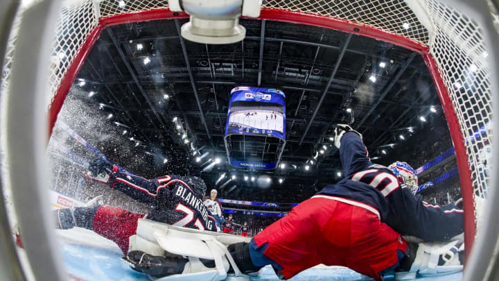 TAMPERE, FINLAND – NOVEMBER 05: goalkeeper Joonas Korpisalo of Columbus (R) and Nick Blankenburg of Columbus in action on Artturi Lehkonen of Colarado goal during the 2022 NHL Global Series – Finland match between Colorado Avalanche and Columbus Blue Jackets at Nokia Arena on November 5, 2022 in Tampere, Finland. (Photo by Jari Pestelacci/Eurasia Sport Images/Getty Images)