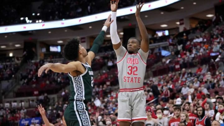 Ohio State Buckeyes forward E.J. Liddell (32) shoots over Michigan State Spartans forward Malik Hall (25) during the first half of the NCAA men's basketball game at Value City Arena in Columbus on March 3, 2022.Michigan State Spartans At Ohio State Buckeyes