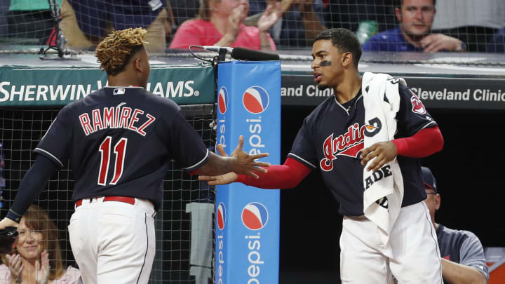 CLEVELAND, OH – JULY 14: Jose Ramirez #11 of the Cleveland Indians is congratulated by teammate Francisco Lindor #12 as he returns to the dugout after scoring against the New York Yankees in the sixth inning at Progressive Field on July 14, 2018 in Cleveland, Ohio. (Photo by David Maxwell/Getty Images)