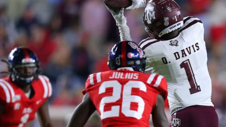 OXFORD, MISSISSIPPI - OCTOBER 19: Quartney Davis #1 of the Texas A&M Aggies catches the ball as Jalen Julius #26 of the Mississippi Rebels defends during the first half at Vaught-Hemingway Stadium on October 19, 2019 in Oxford, Mississippi. (Photo by Jonathan Bachman/Getty Images)