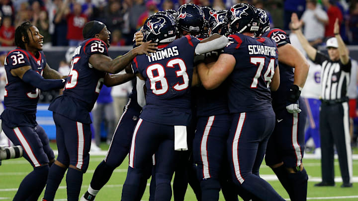 HOUSTON, TEXAS – JANUARY 04: The Houston Texans celebrate Ka’imi Fairbairn #7 field goal in overtime to win the AFC Wild Card Playoff game 22-19 over the Buffalo Bills at NRG Stadium on January 04, 2020 in Houston, Texas. (Photo by Bob Levey/Getty Images)