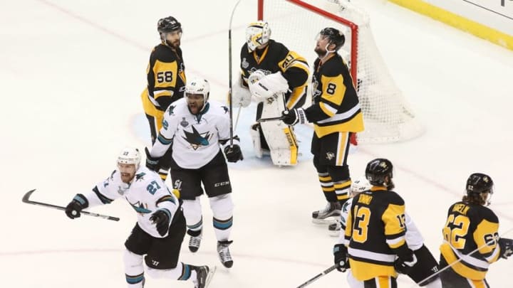 Jun 1, 2016; Pittsburgh, PA, USA; San Jose Sharks right wing Joonas Donskoi (27) and right wing Joel Ward (42) celebrate after a goal by defenseman Justin Braun (not pictured) against the Pittsburgh Penguins in the third period of game two of the 2016 Stanley Cup Final at Consol Energy Center. Mandatory Credit: Charles LeClaire-USA TODAY Sports