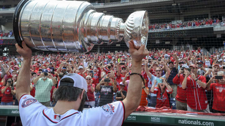 WASHINGTON, DC – JUNE 09: Washington Capitals captain, Alex Ovechkin walks off the field with the Stanley Cup held over his head prior to the game between the San Fransisco Giants and the Washington Nationals on June 9, 2018, at Nationals Park, in Washington D.C. (Photo by Mark Goldman/Icon Sportswire via Getty Images)