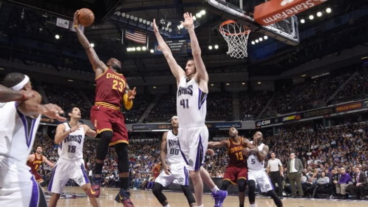 SACRAMENTO, CA - MARCH 9: LeBron James #23 of the Cleveland Cavaliers shoots against Kosta Koufos #41 of the Sacramento Kings on March 9, 2016 at Sleep Train Arena in Sacramento, California. NOTE TO USER: User expressly acknowledges and agrees that, by downloading and or using this photograph, User is consenting to the terms and conditions of the Getty Images Agreement. Mandatory Copyright Notice: Copyright 2016 NBAE (Photo by Rocky Widner/NBAE via Getty Images)