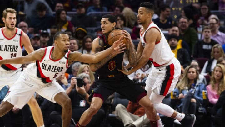 CLEVELAND, OH - FEBRUARY 25: Rodney Hood #5 and CJ McCollum #3 of the Portland Trail Blazers put pressure on Jordan Clarkson #8 of the Cleveland Cavaliers during the second half at Quicken Loans Arena on February 25, 2019 in Cleveland, Ohio. The Trail Blazers defeated the Cavaliers 123-110. NOTE TO USER: User expressly acknowledges and agrees that, by downloading and/or using this photograph, user is consenting to the terms and conditions of the Getty Images License Agreement. (Photo by Jason Miller/Getty Images)