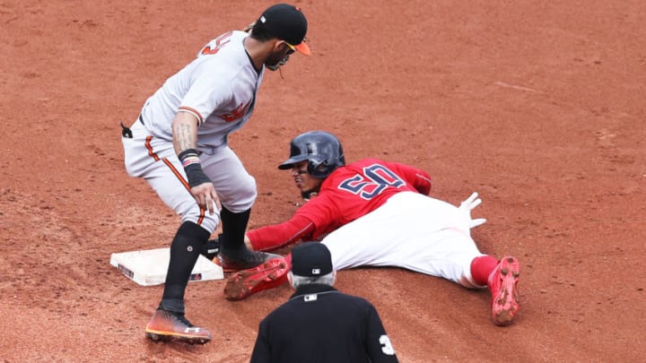BOSTON, MA - SEPTEMBER 26: Mookie Betts #50 of the Boston Red Sox steals second past Jonathan Villar #2 of the Baltimore Orioles during the second inning at Fenway Park on September 26, 2018 in Boston, Massachusetts. (Photo by Maddie Meyer/Getty Images)