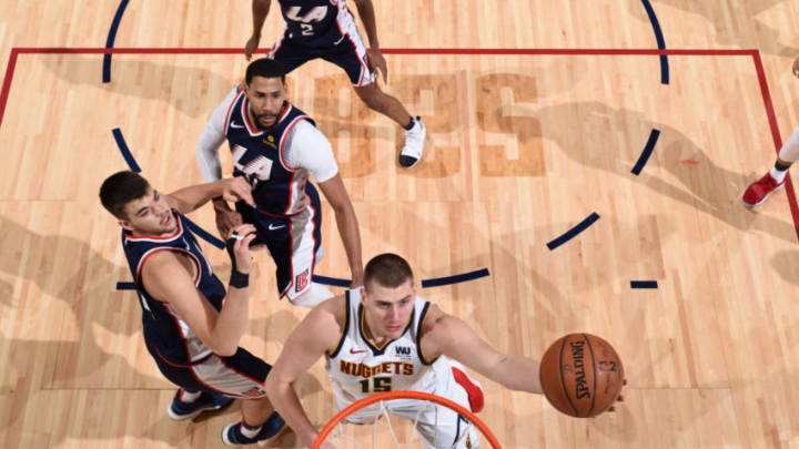 DENVER, CO - FEBRUARY 24: Nikola Jokic #15 of the Denver Nuggets shoots the ball against the LA Clippers on February 24, 2019 at the Pepsi Center in Denver, Colorado. NOTE TO USER: User expressly acknowledges and agrees that, by downloading and/or using this Photograph, user is consenting to the terms and conditions of the Getty Images License Agreement. Mandatory Copyright Notice: Copyright 2019 NBAE (Photo by Garrett Ellwood/NBAE via Getty Images)